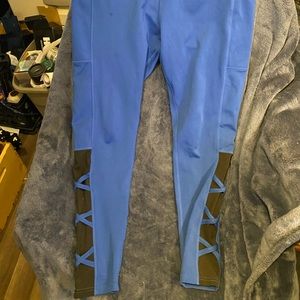 POP fit leggings with pockets. Blue with straps, size large. worn a couple times